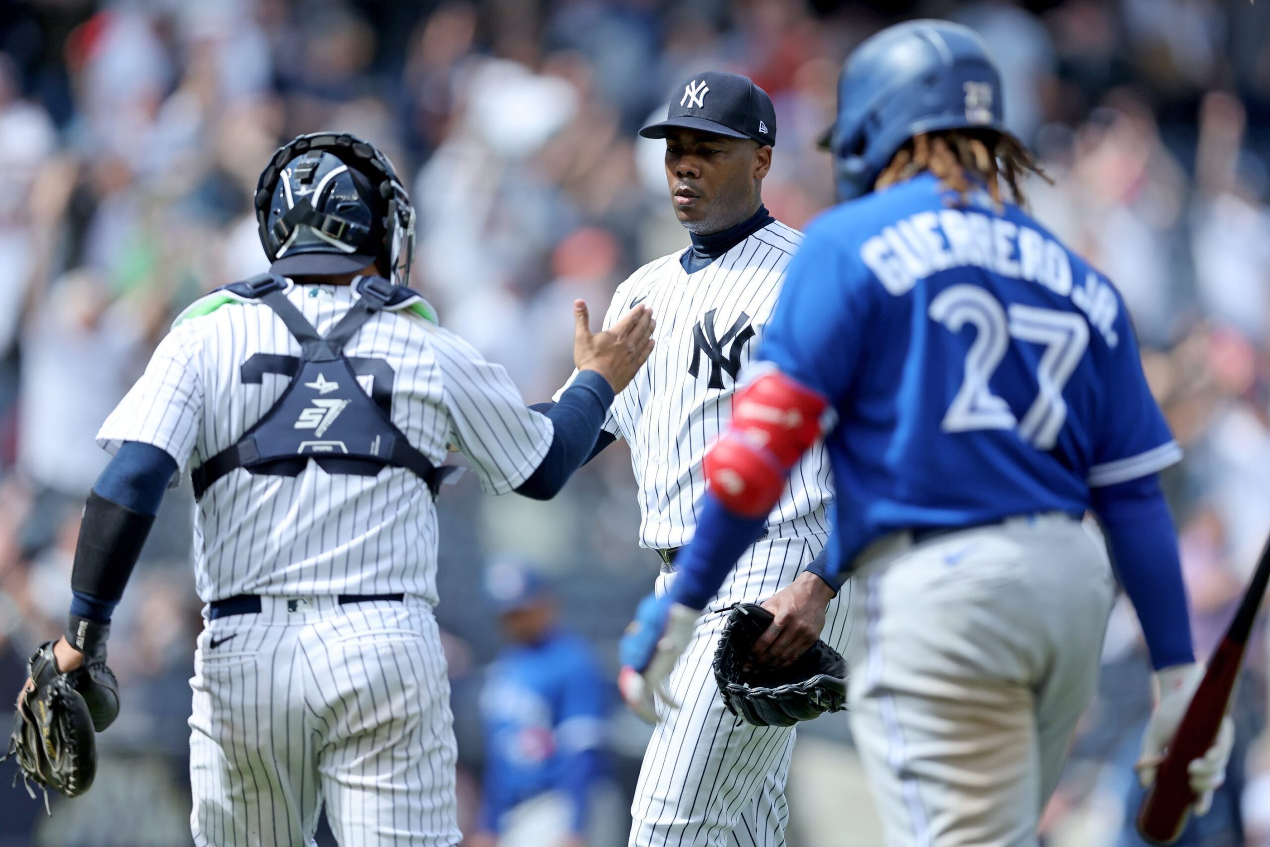 New York Yankees relief pitcher Aroldis Chapman celebrates with catcher Jose Trevino