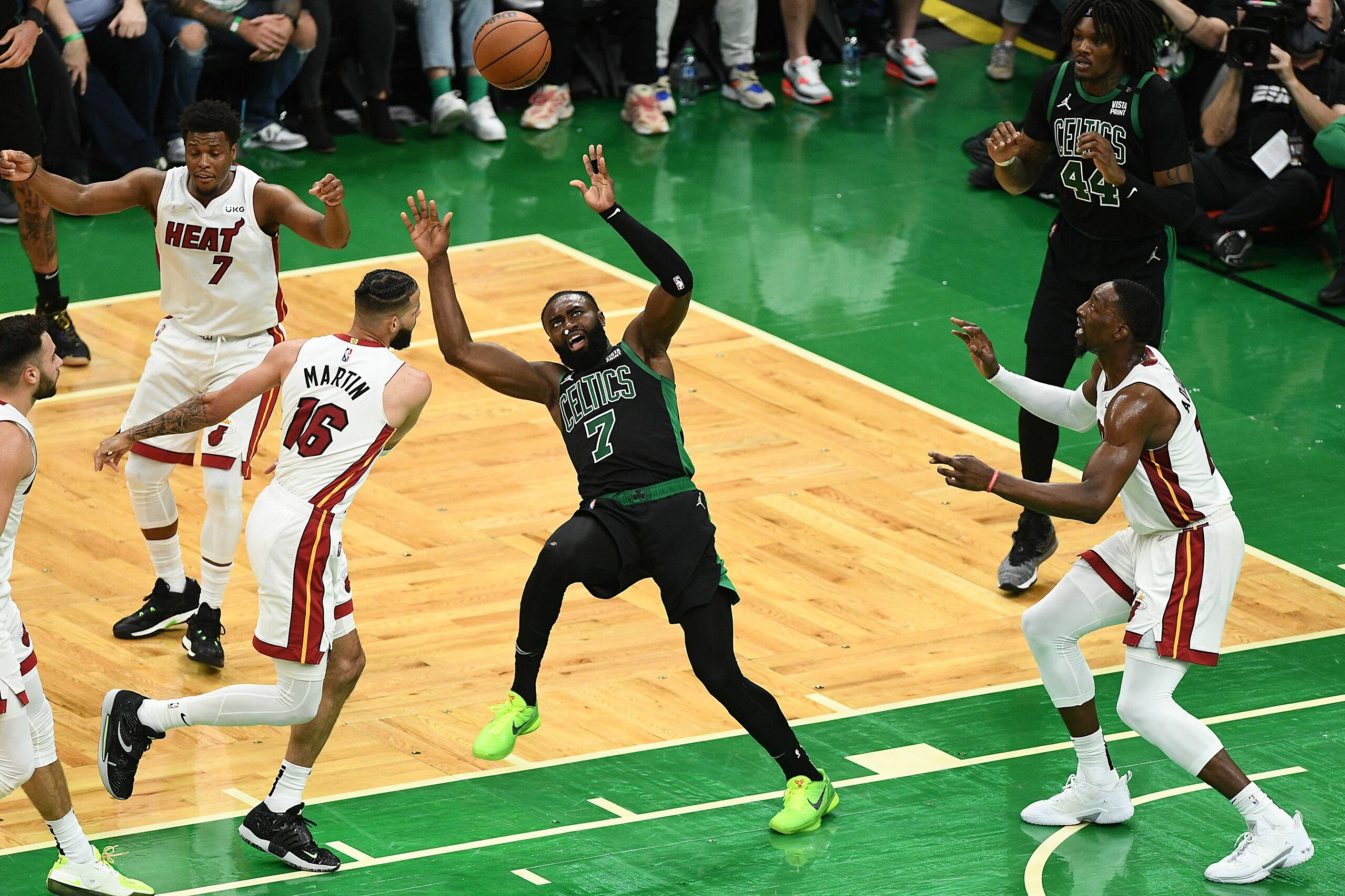 Boston Celtics guard Jaylen Brown loses the ball against Miami Heat forward Caleb Martin