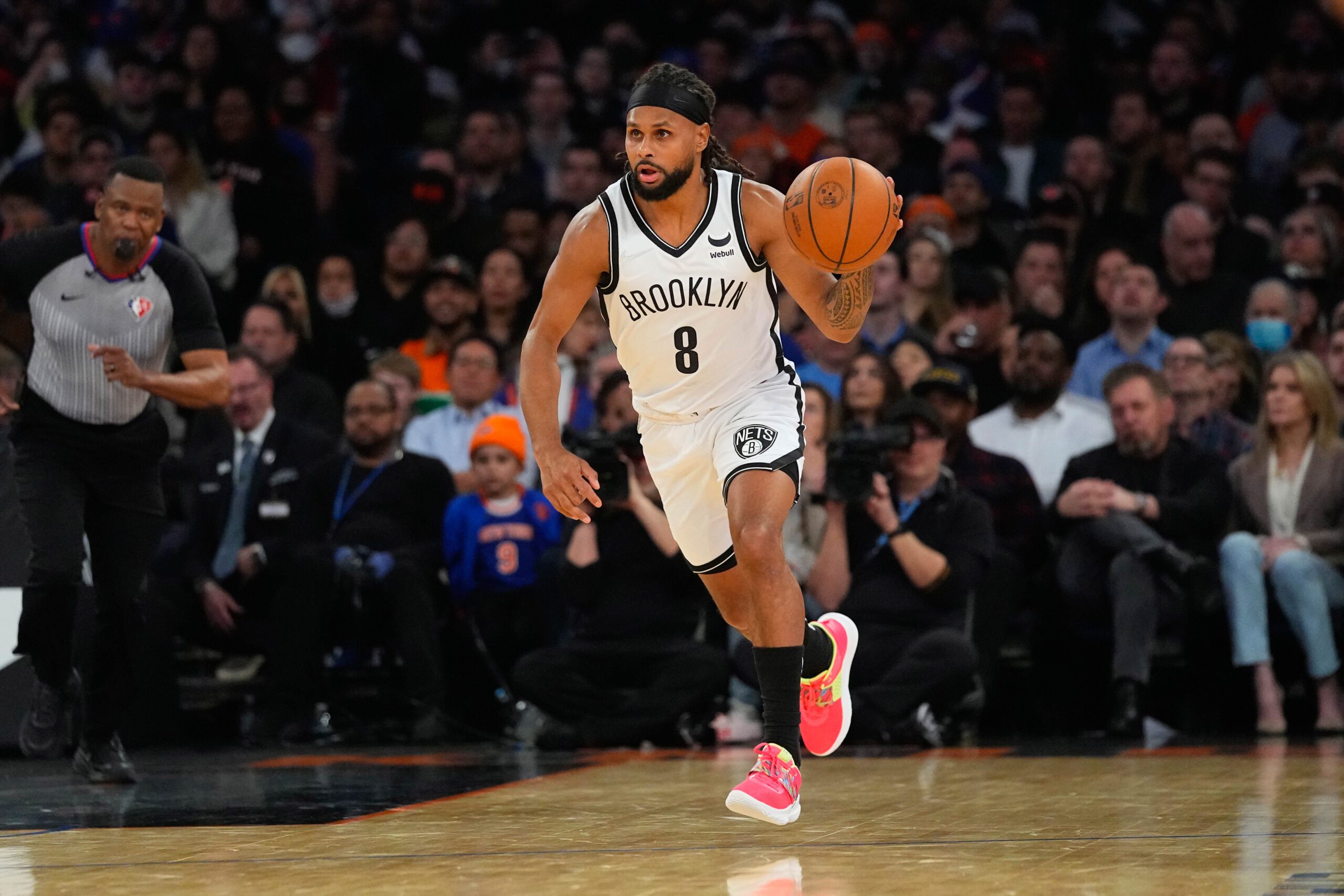 Brooklyn Nets point guard Patty Mills dribbles the ball up the court
